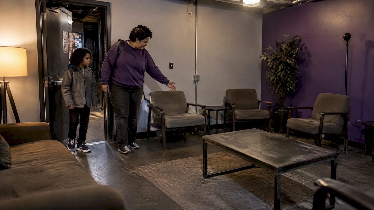 Caregiver and child finding a venue quiet room