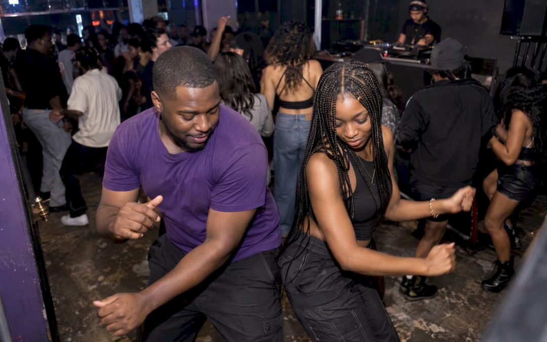 Friends dancing at a New Jersey hip hop night